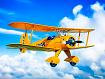 Yellow_Biplane_Blue_Sky.jpg